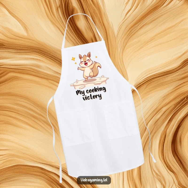 Funny apron featuring an excited squirrel dancing after winning a game level, kitchen gear for gamer chefs.