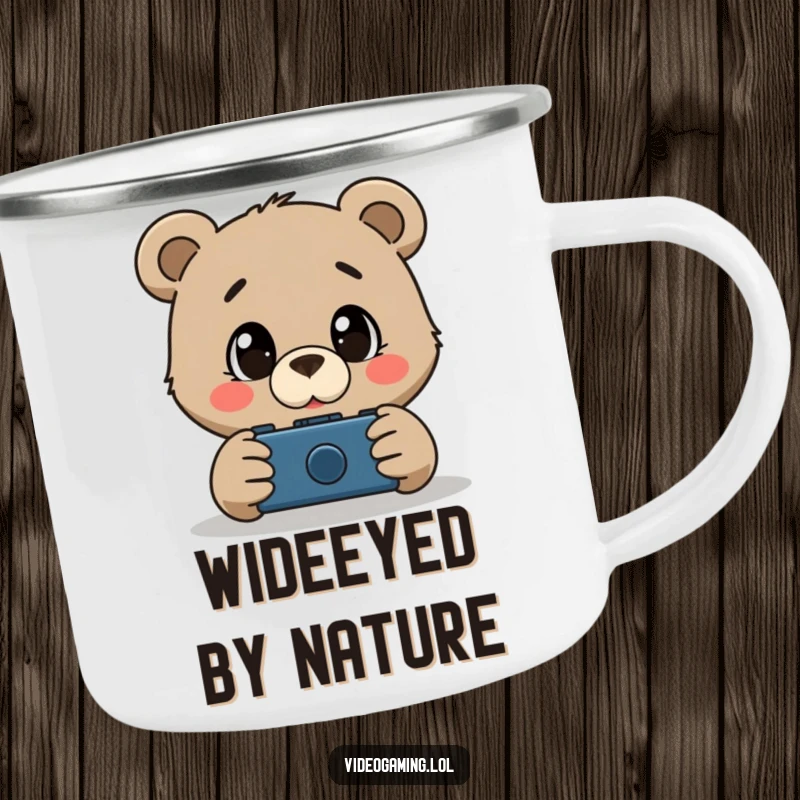 Funny camping mug depicting a curious bear with large, amazed eyes watching a screen, perfect for outdoor gamers.