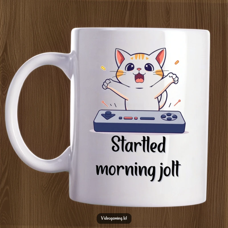 Funny Cat Gaming Mug: A surprised cat leaps backward from a fast-paced game, capturing comical gaming shock.