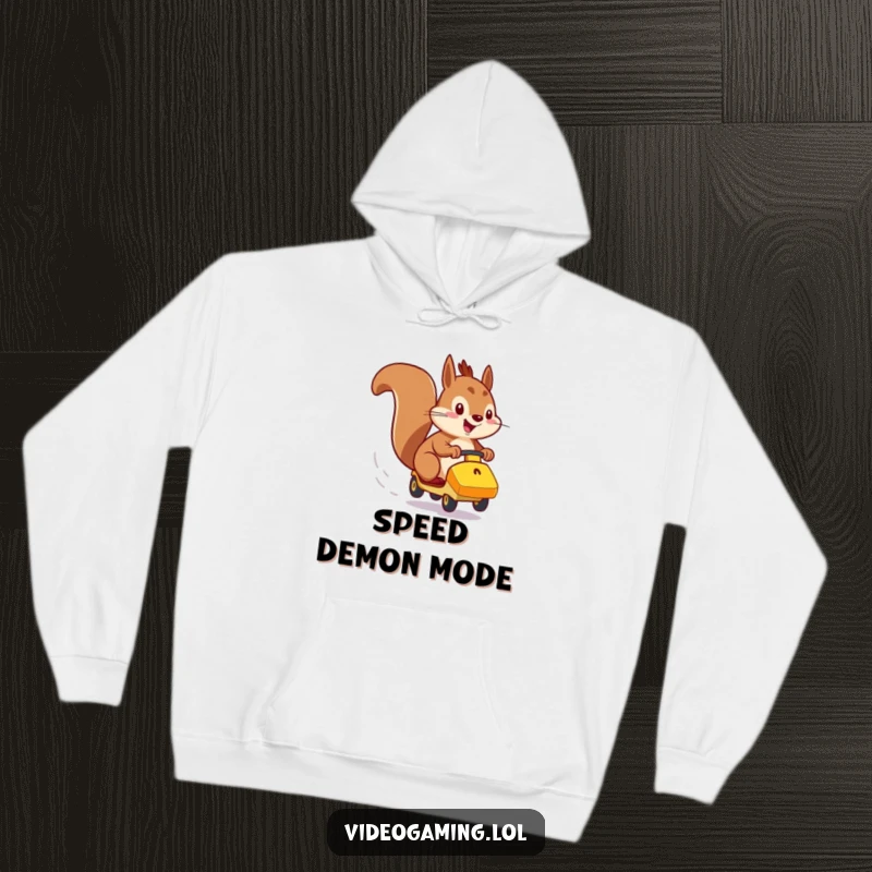 Funny hoodie featuring a highly energetic squirrel racing a small vehicle with a determined expression.