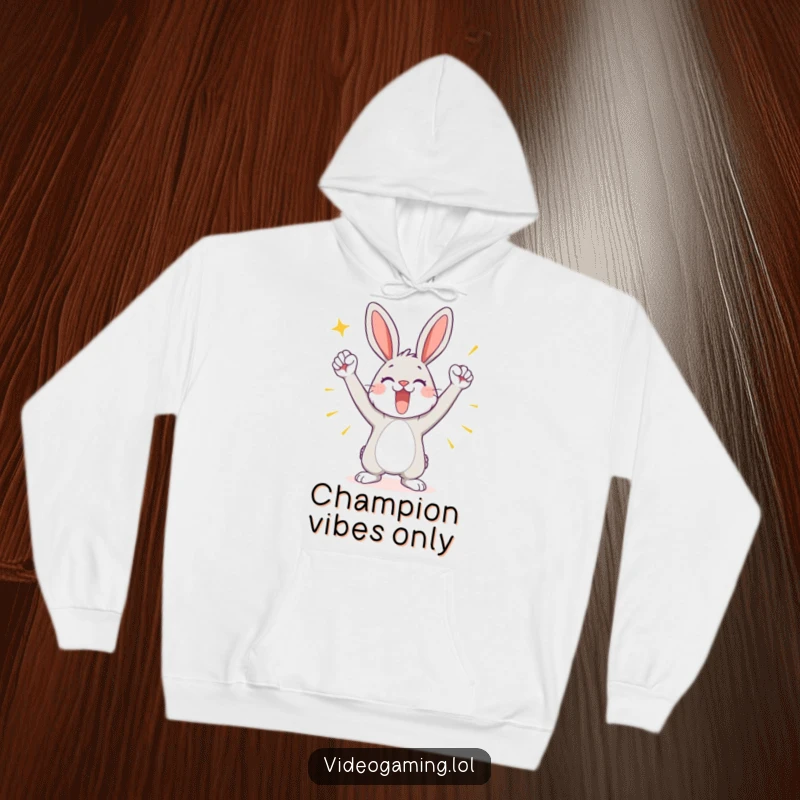 Funny hoodie featuring a playful bunny in a triumphant pose, celebrating a victorious moment with infectious joy.