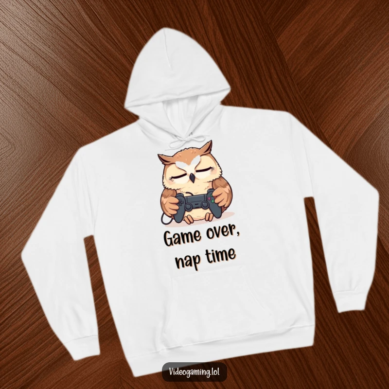 Funny Tired Owl Hoodie, napping soundly with a controller resting on its chest, offering cozy, humorous warmth.