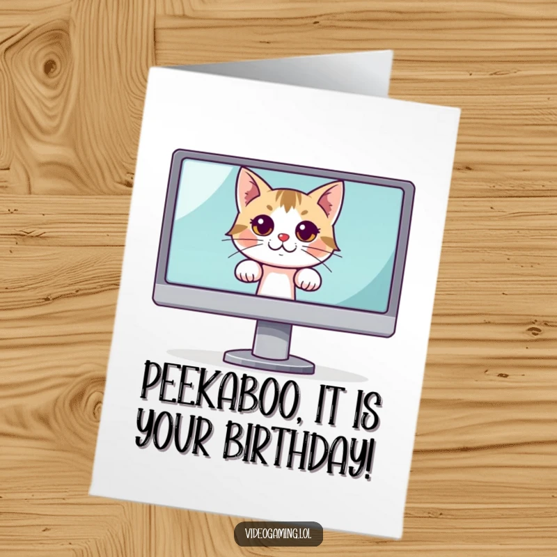 Funny Free Printable Birthday Card of a curious cat peeking from behind a large monitor, a delightful downloadable gift.