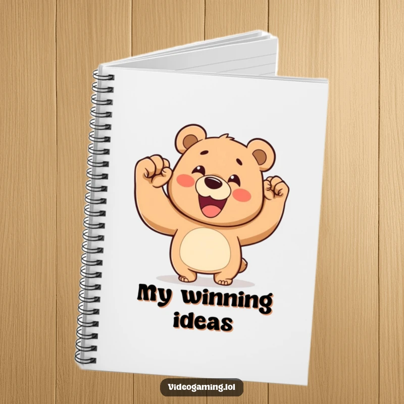Funny notebook cover featuring a happy bear pumping its fist in a gesture of victory.