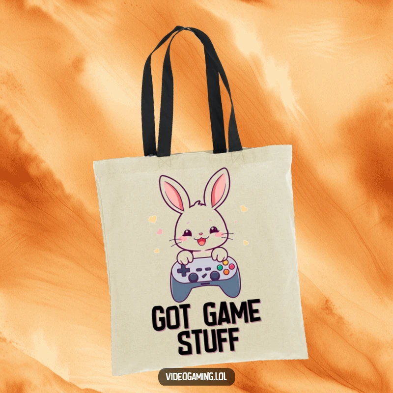 Funny rabbit gamer tote bag, depicting a cheerful rabbit rapidly tapping game controller buttons, a gamer accessory.
